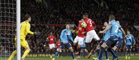 Victorii pentru Manchester United si Liverpool